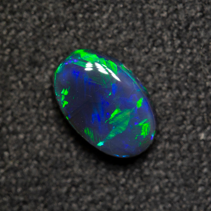 0.53 ct black opal 6.5x4.3x2.6mm