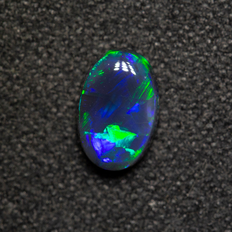 0.53 ct black opal 6.5x4.3x2.6mm