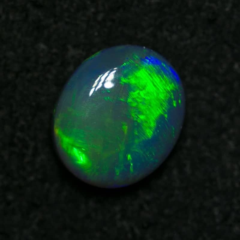 0.53 ct dark opal 6x5x2mm