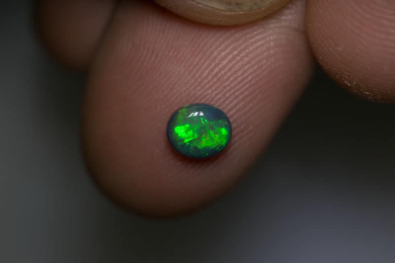 0.53 ct dark opal 6x5x2mm