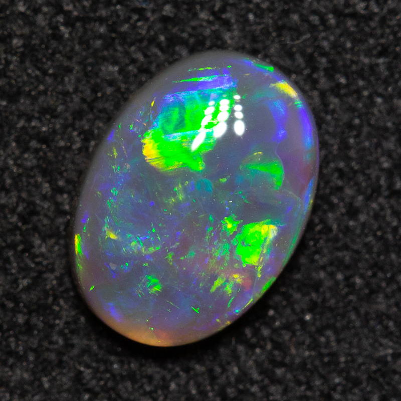 0.54 ct dark opal 7x5.1x2.2mm