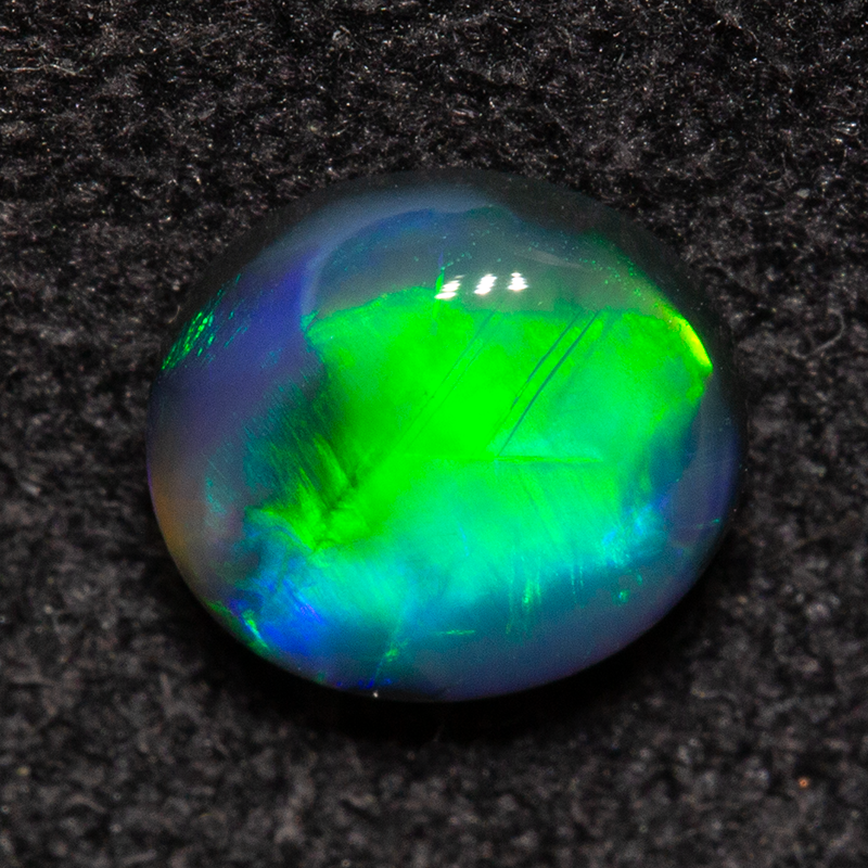 0.54 ct black opal 5.8x5.3x2.5mm