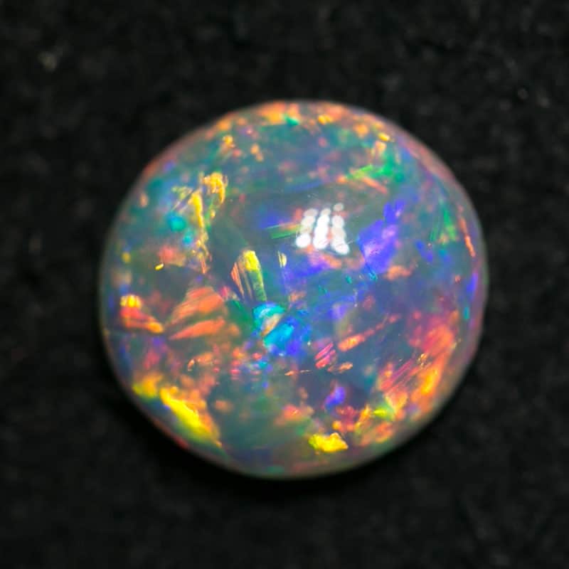 0.54 ct gem crystal opal 6mm round x2mm