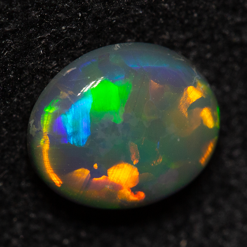 0.55 ct dark opal 6x5x2mm