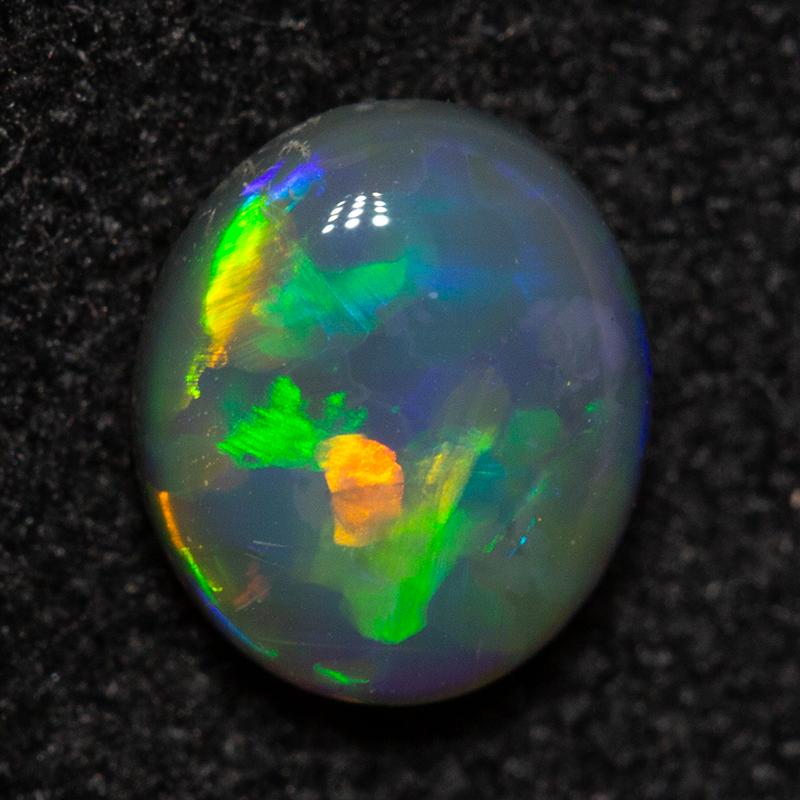 0.55 ct dark opal 6x5x2mm