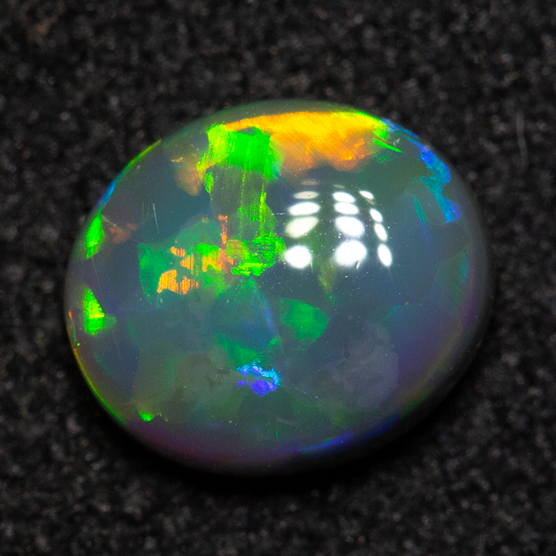 0.55 ct dark opal 6x5x2mm
