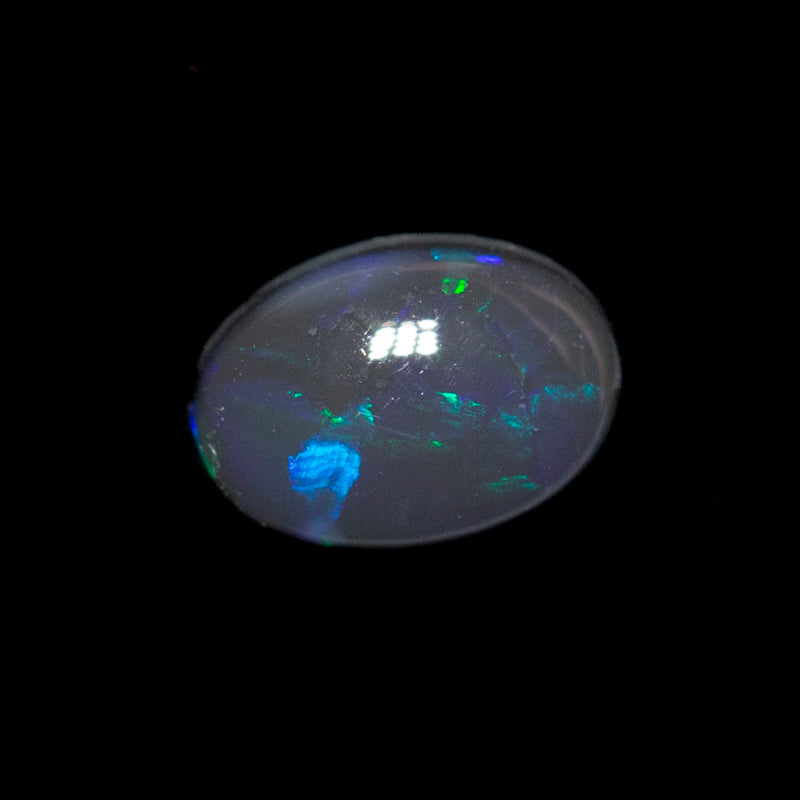 0.55 ct black opal 6.5x4.6x2.8mm