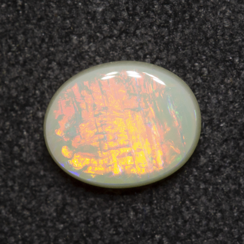 0.55 ct white opal 6.6x5.3x2.2mm