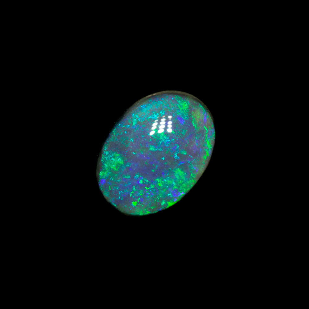 0.55 ct black opal 6.4x4.8x2.7mm