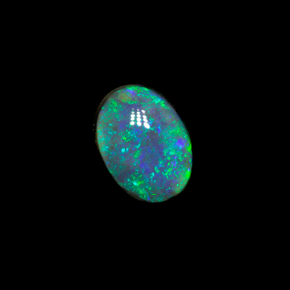 0.55 ct black opal 6.4x4.8x2.7mm