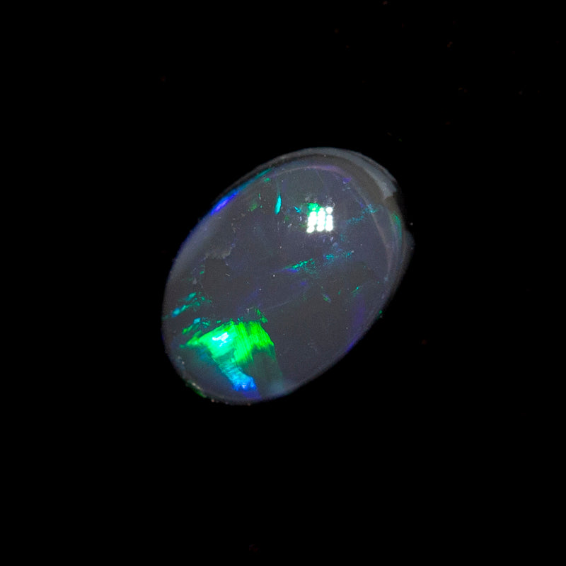 0.55 ct black opal 6.5x4.6x2.8mm