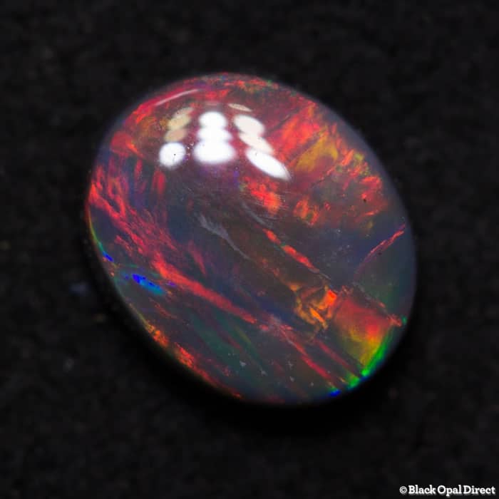 0.55 ct gem back opal 6.5x5x2.5mm