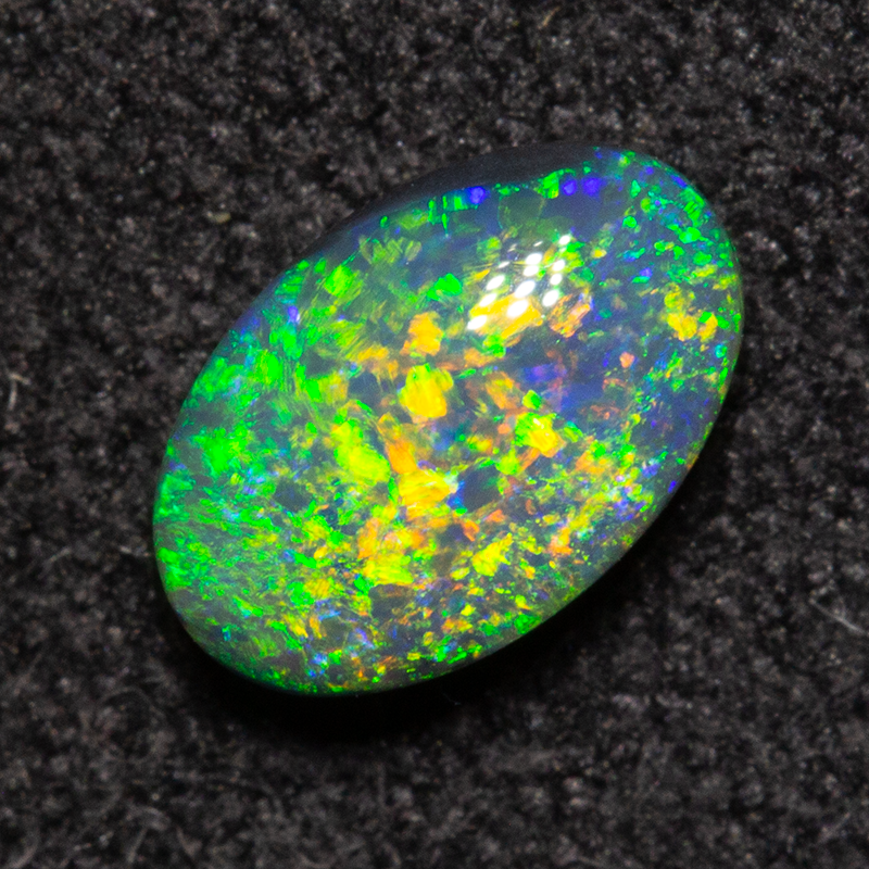 0.56 ct double-sided black opal 6.9x4.5x2.8mm