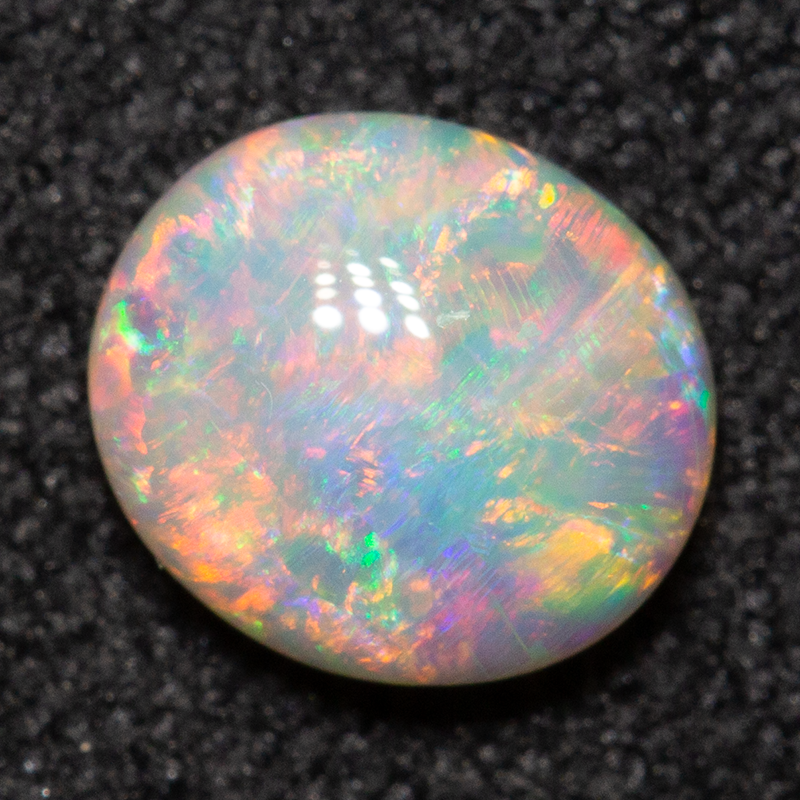 0.57 ct crystal opal 6.1x5.4x2.7mm