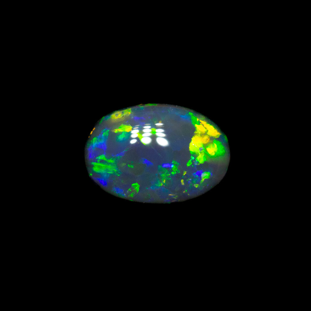 0.57 ct black opal 6.6x4.6x2.9mm