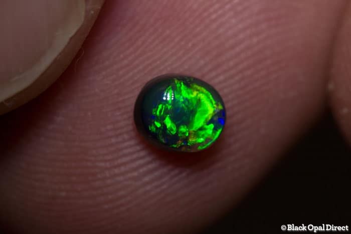 0.57 ct black opal 5.5x5x3mm