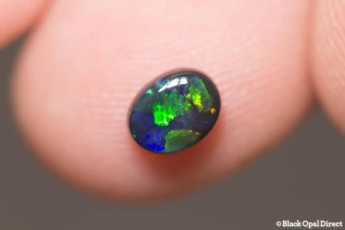 0.57 ct black opal 6x4.5x2mm