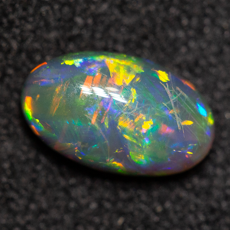 0.58 ct black opal 7.3x4.4x2.8mm