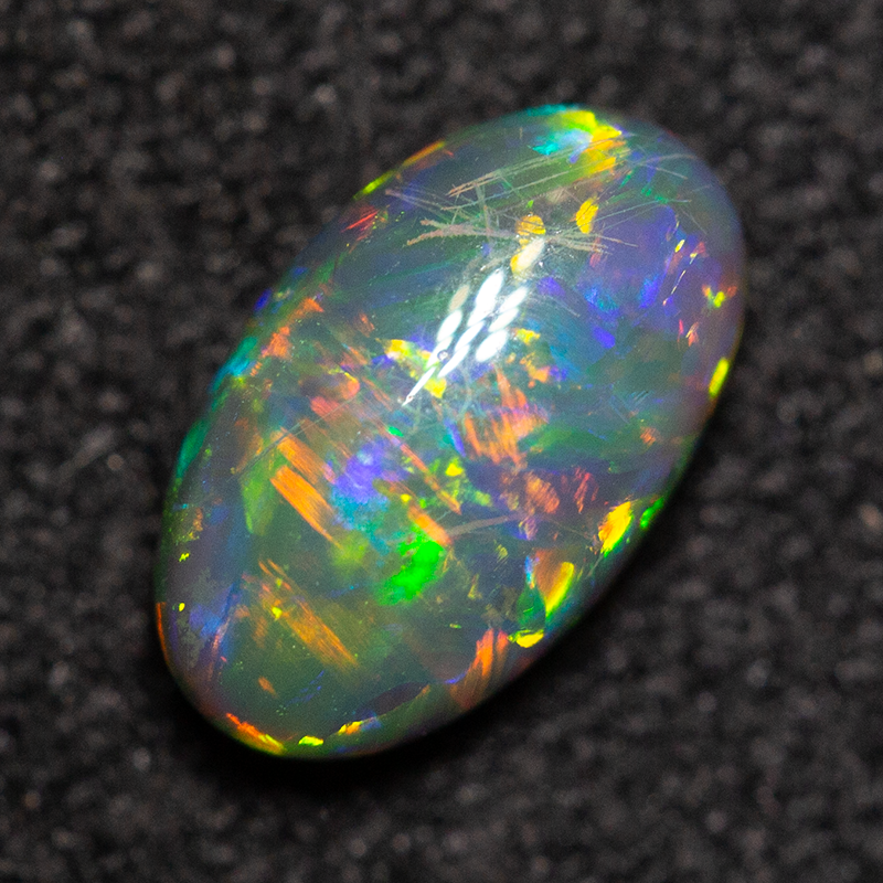 0.58 ct black opal 7.3x4.4x2.8mm