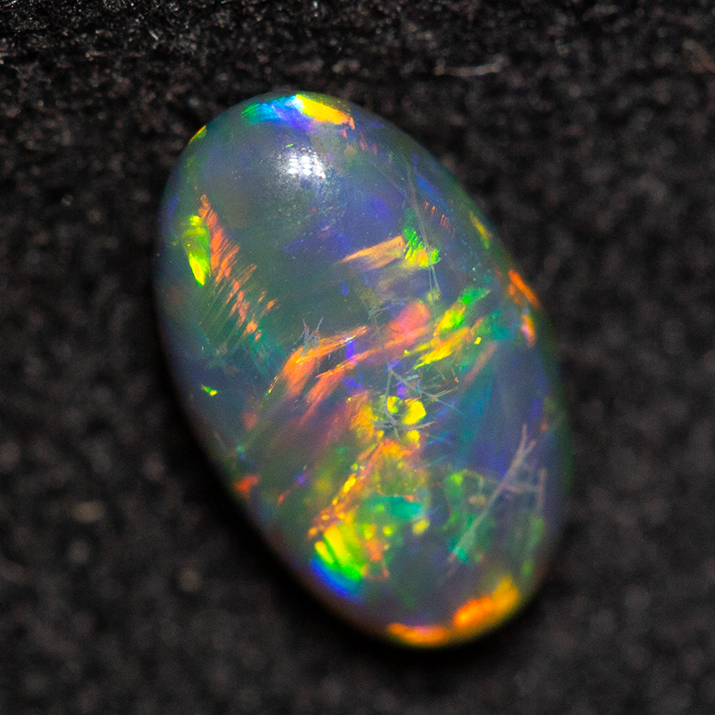 0.58 ct black opal 7.3x4.4x2.8mm