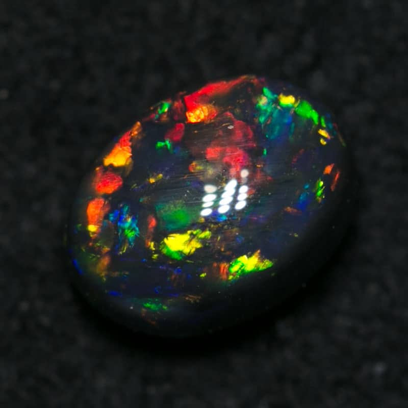 0.58 ct gem black opal 6x5x3