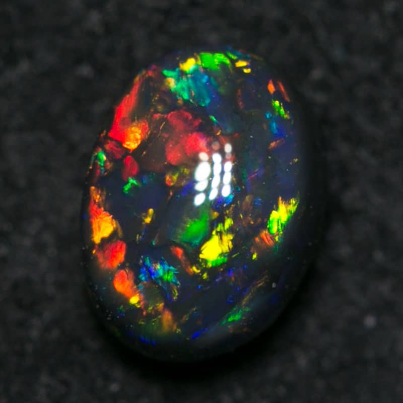 0.58 ct gem black opal 6x5x3