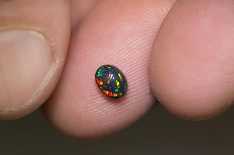 0.58 ct gem black opal 6x5x3