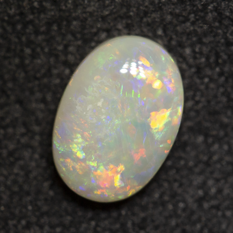 0.59 ct white opal 6.8x4.8x2.5mm