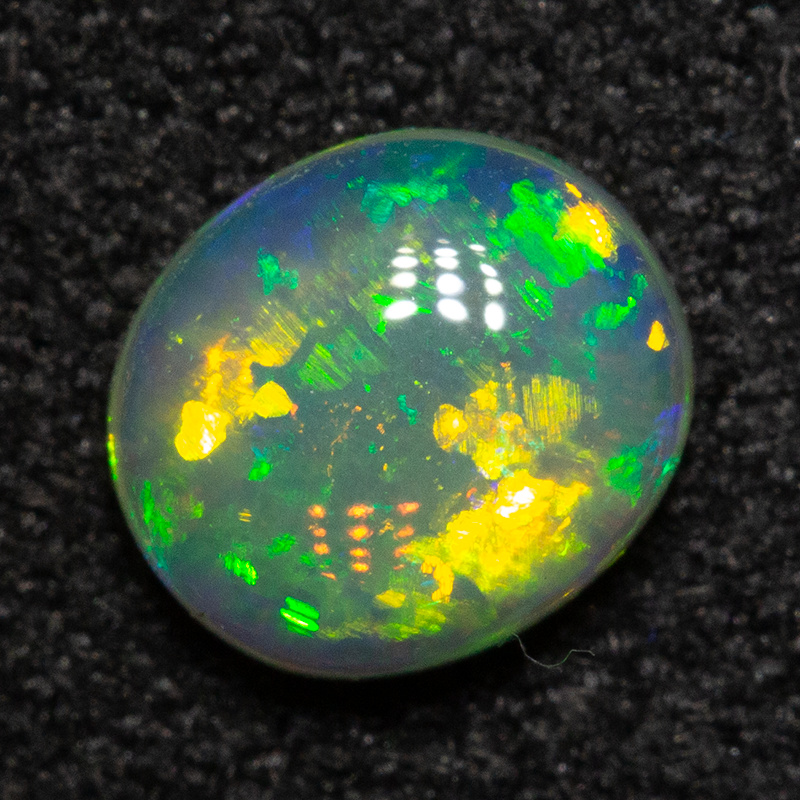 0.59 ct double-sided crystal opal 6.2x5.4x2.6mm