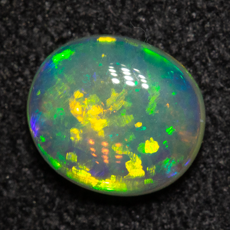 0.59 ct double-sided crystal opal 6.2x5.4x2.6mm