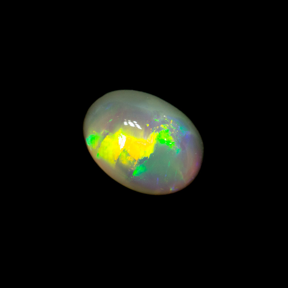0.59 ct dark opal 6.1x4.4x3.4mm