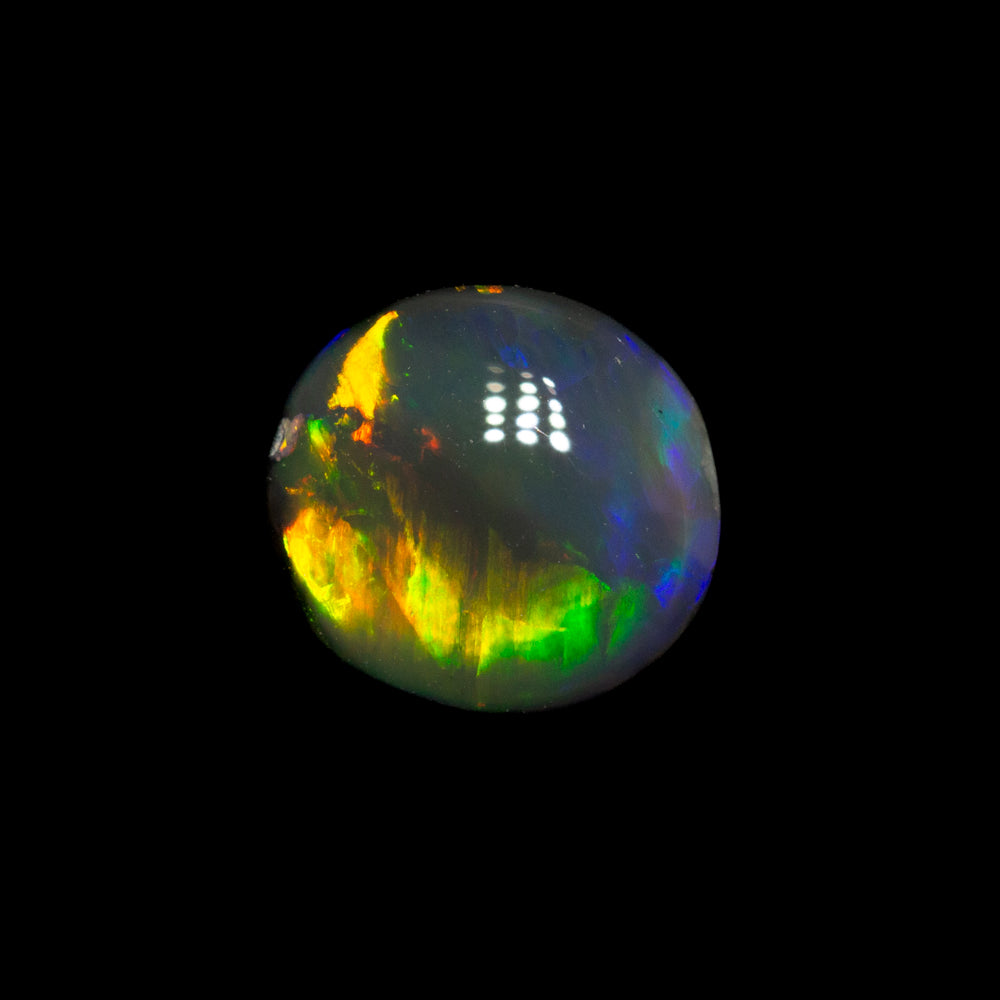 0.59 ct black opal 6.3x5.8x2.3mm