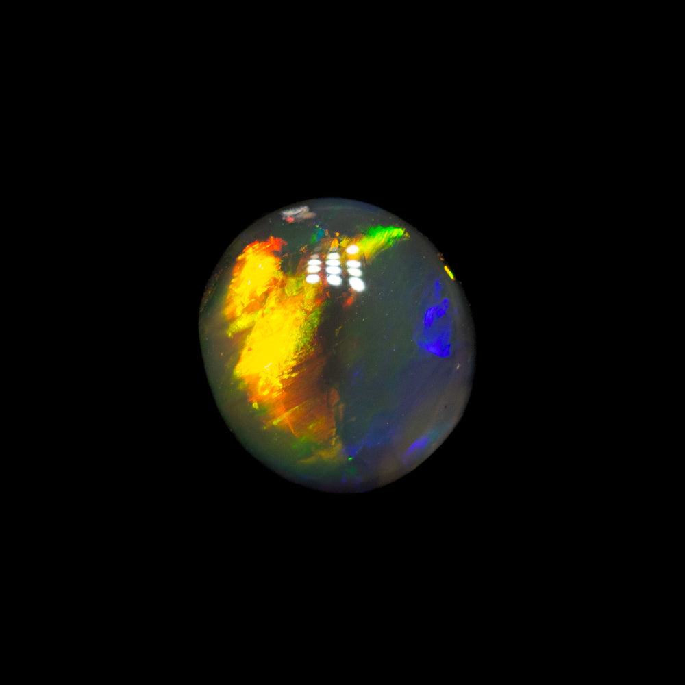 0.59 ct black opal 6.3x5.8x2.3mm