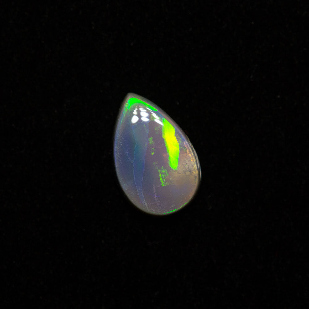 0.60 ct dark opal 7.8x5.1x2.2mm