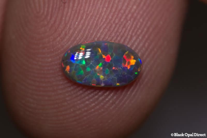 0.50 ct semi black opal 8.5x5x1.5mm