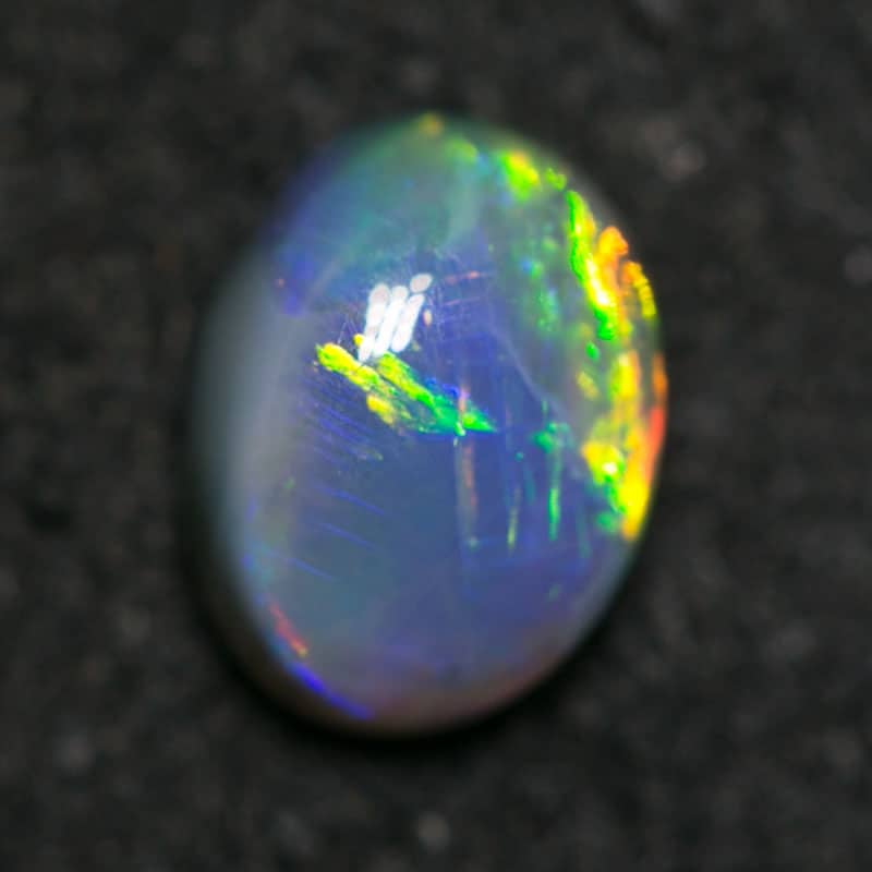 0.61 ct black opal 6x4x3mm