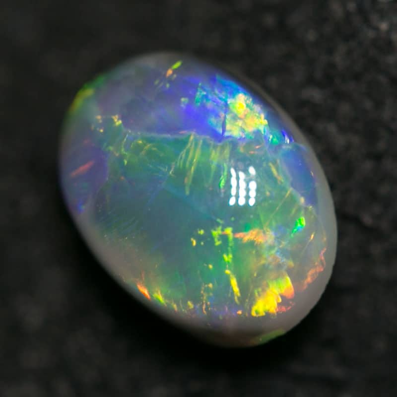 0.61 ct black opal 6x4x3mm