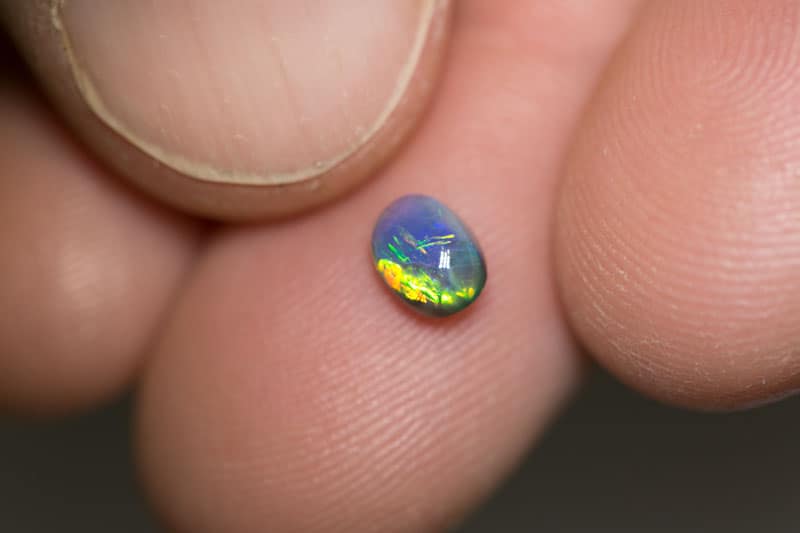 0.61 ct black opal 6x4x3mm