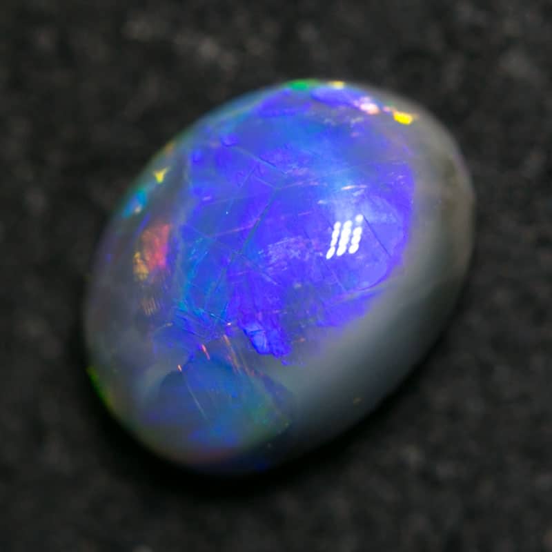 0.61 ct black opal 6x4x3mm