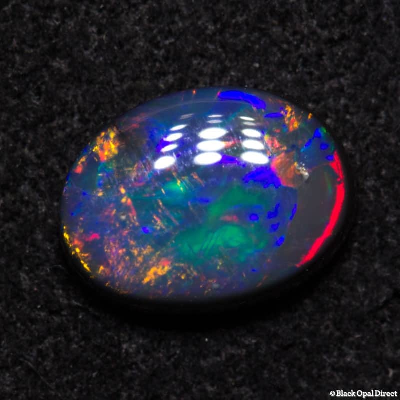 0.61 ct black opal gem 7x5x2.2mm