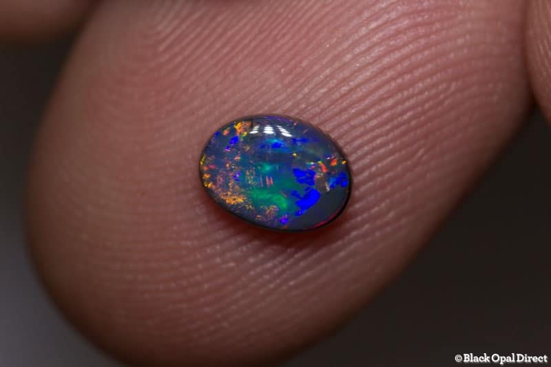 0.61 ct black opal gem 7x5x2.2mm