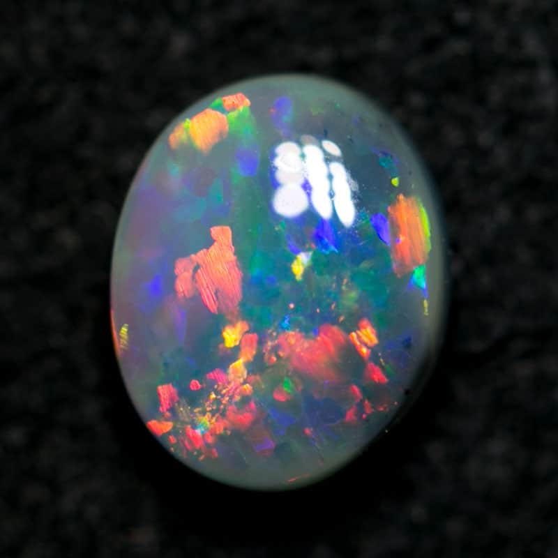 0.62 ct semi black opal 6.5x5x3mm