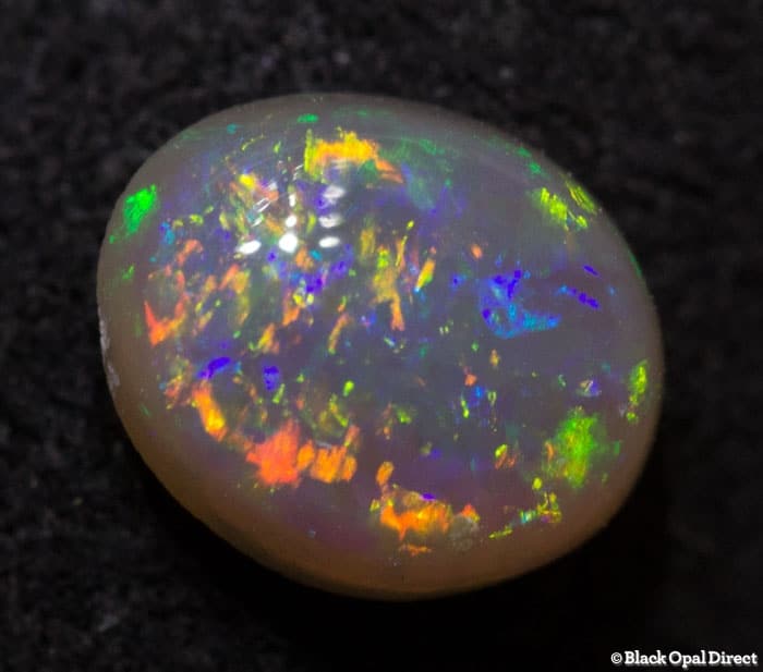 0.63 ct semi black opal 6.5x5x3mm