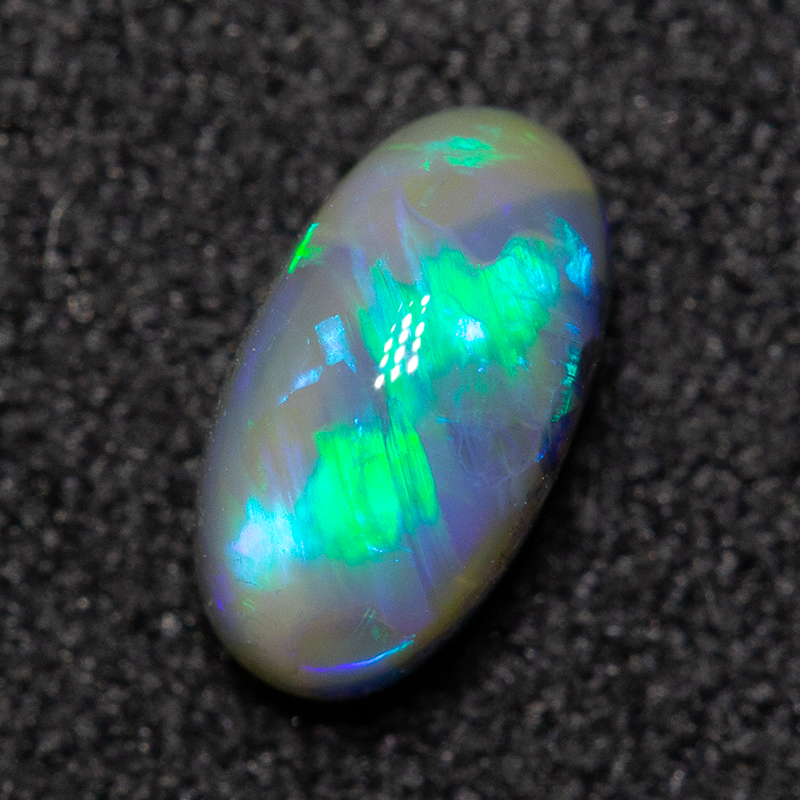 0.64 ct black opal 6.9x3.8x3.7mm