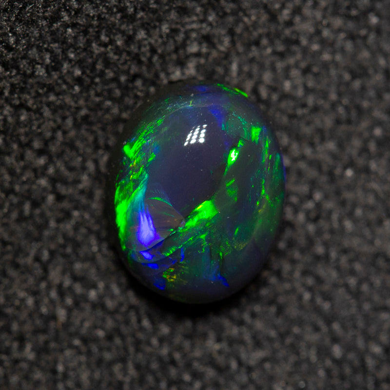 0.64 ct black opal 6.4x5x3.3mm