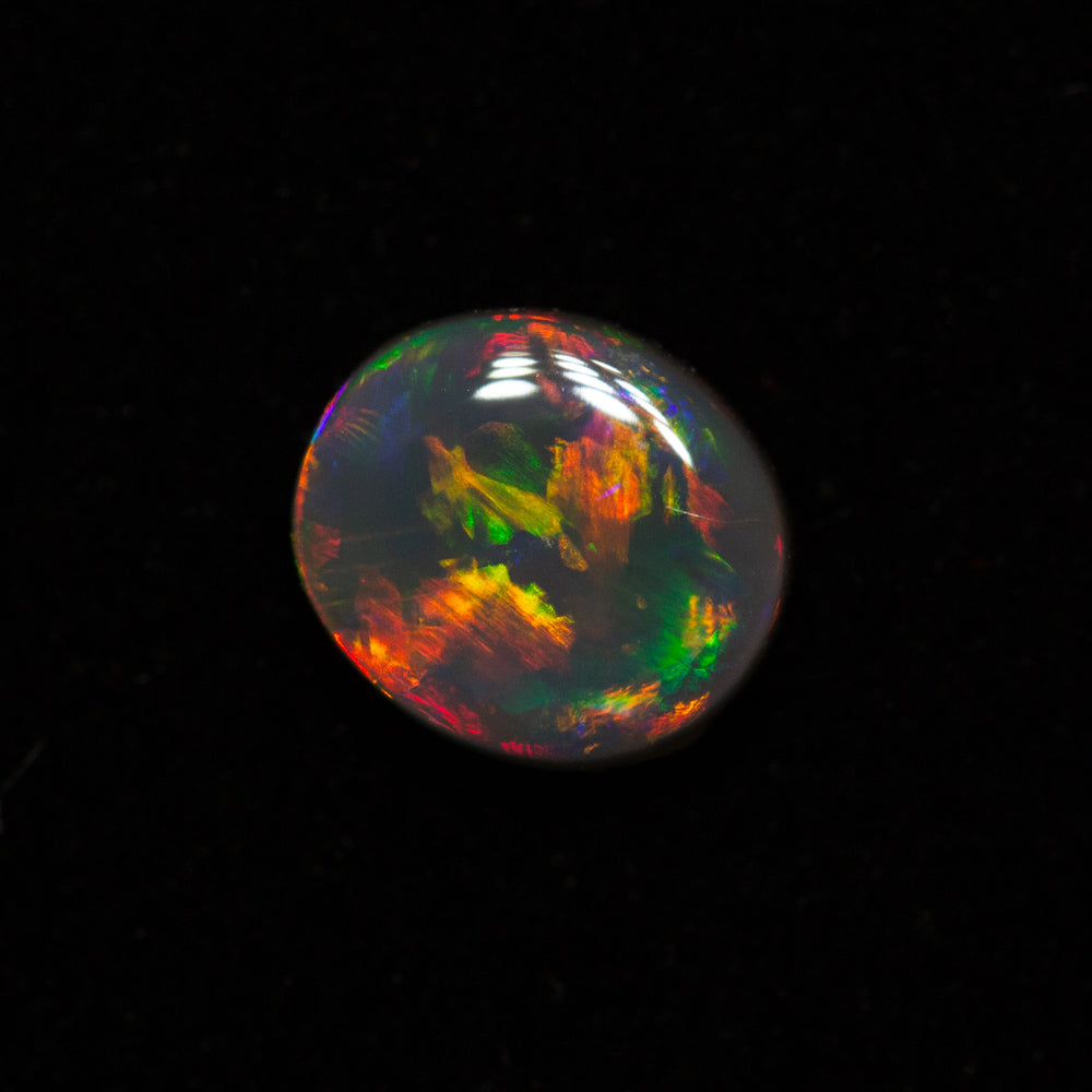 0.64 ct gem black opal 6.3x5.5x2.6mm