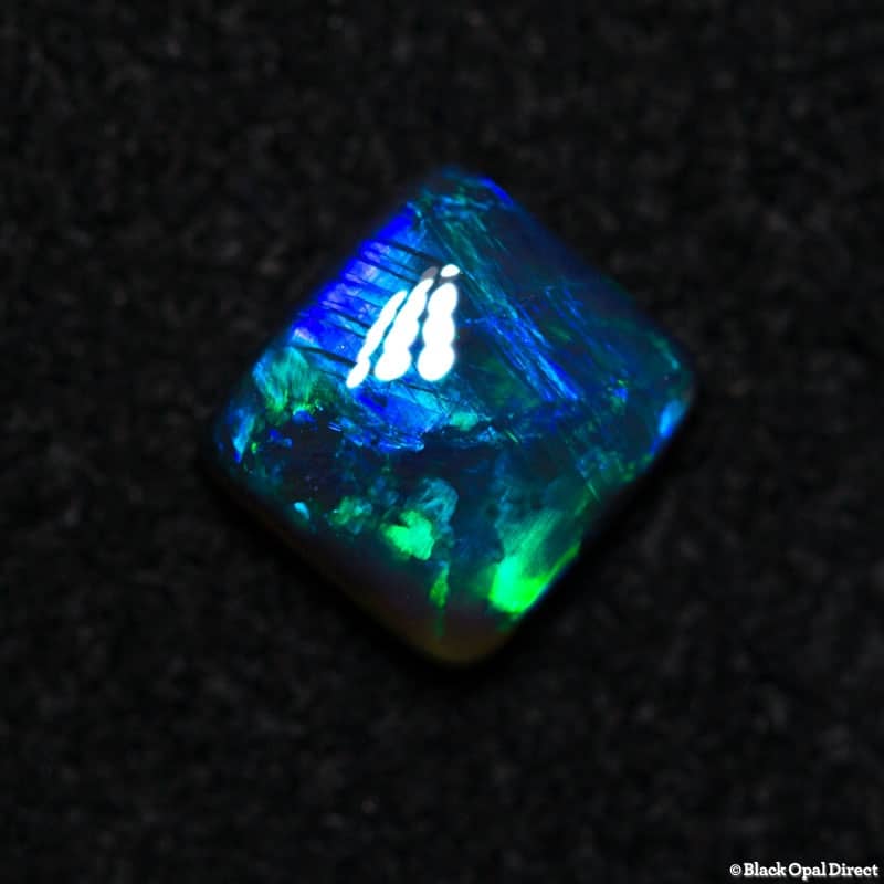0.64ct black opal cushion