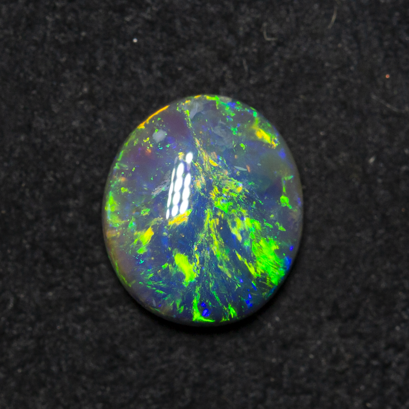 0.65 ct black opal 7.1x6.2x2.5mm