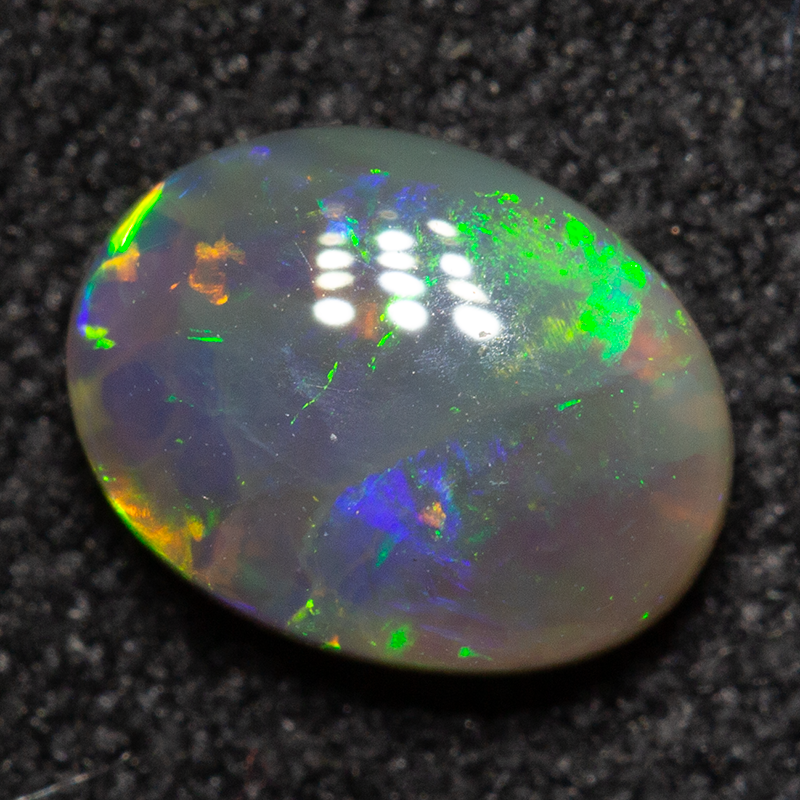 0.65 ct crystal opal 7x5.4x2.8mm
