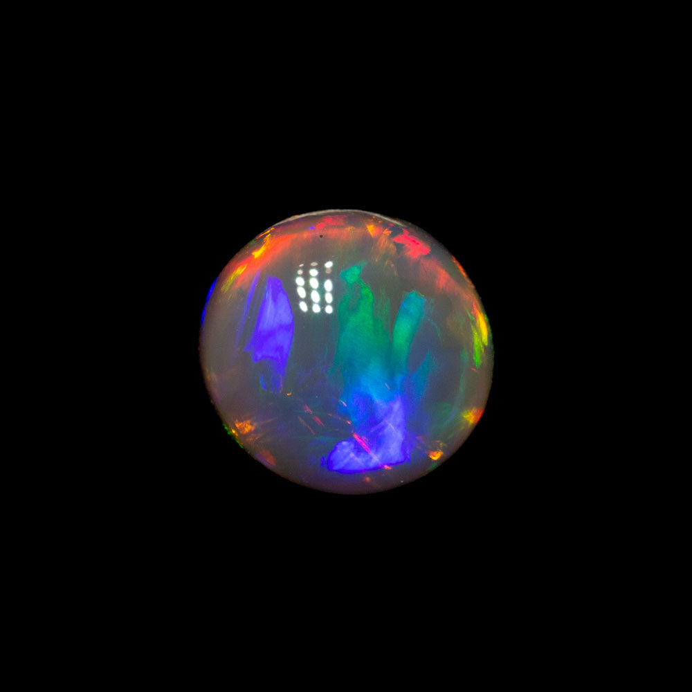 0.65 ct black crystal opal 5.9x5.6x3.3mm